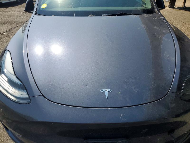 Photo 11 from auction – 2023 TESLA MODEL Y with VIN 7SAYGDEE8PA176607