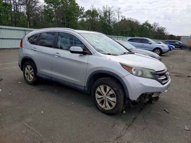 Photo 4 from auction – 2014 HONDA CR-V with VIN 2HKRM4H75EH609955