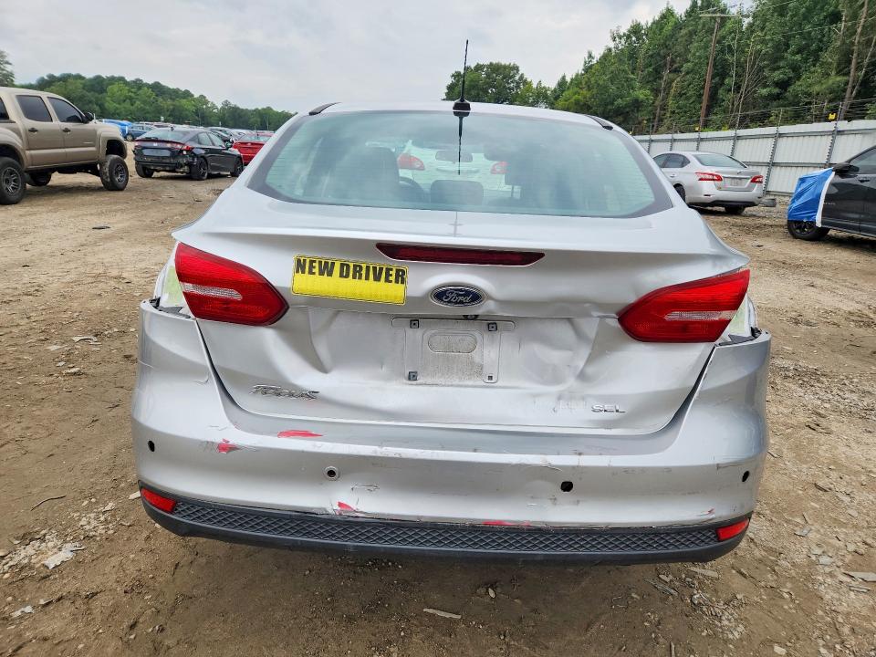 Photo 6 from auction – 2018 FORD FOCUS with VIN 1FADP3H25JL234354
