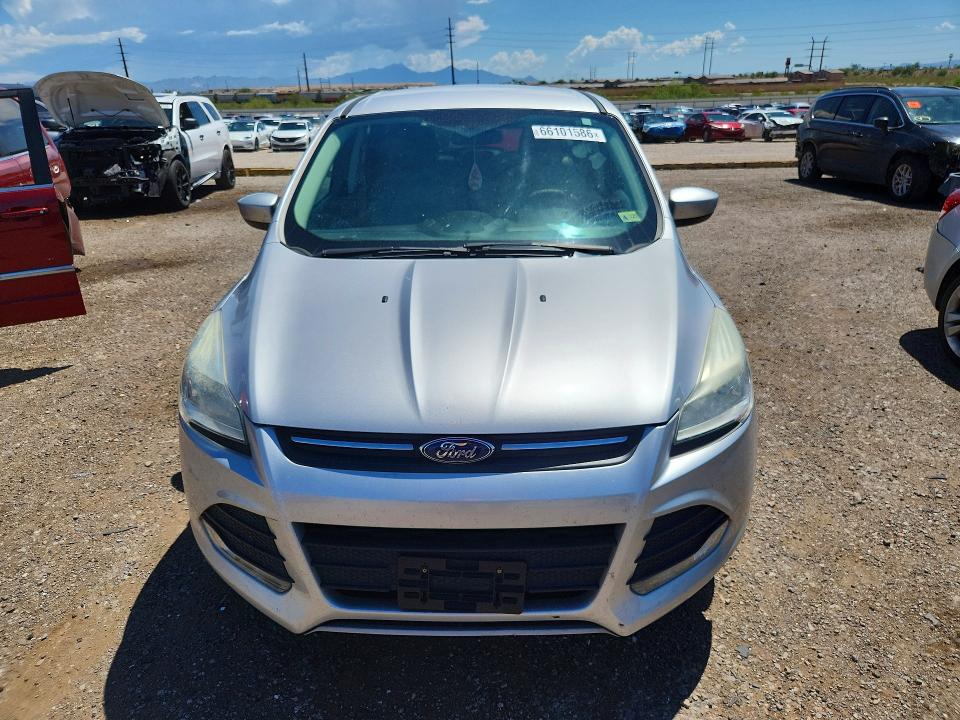 Photo 5 from auction – 2014 FORD ESCAPE with VIN 1FMCU0GXXEUC73897