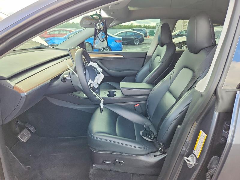 Photo 7 from auction – 2023 TESLA MODEL Y with VIN 7SAYGAEE2PF694780