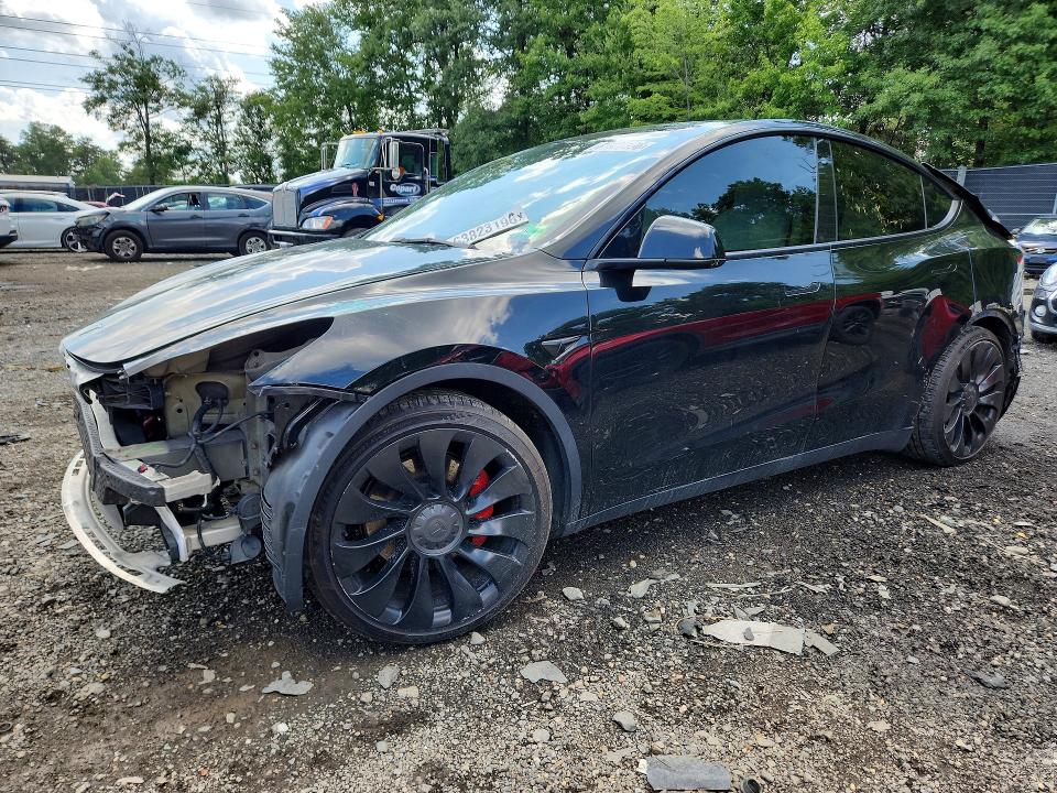 TESLA MODEL Y 2022 with VIN 7SAYGDEF2NF546653 - Photo from auction