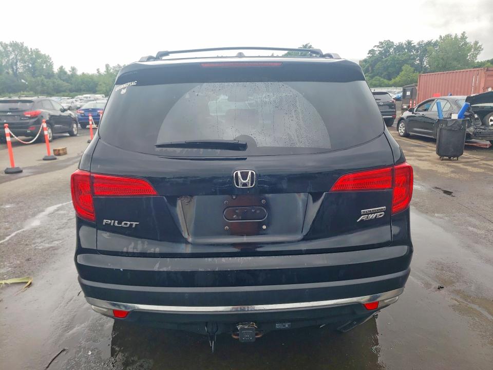 Photo 6 from auction – 2016 HONDA PILOT with VIN 5FNYF6H98GB123015