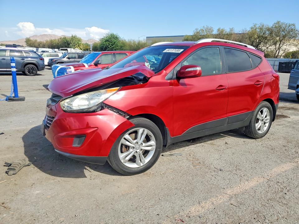 HYUNDAI TUCSON 2012 with VIN KM8JUCAC5CU511179 - Photo from auction