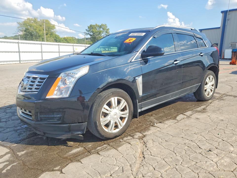 CADILLAC SRX 2015 with VIN 3GYFNBE33FS587512 - Photo from auction