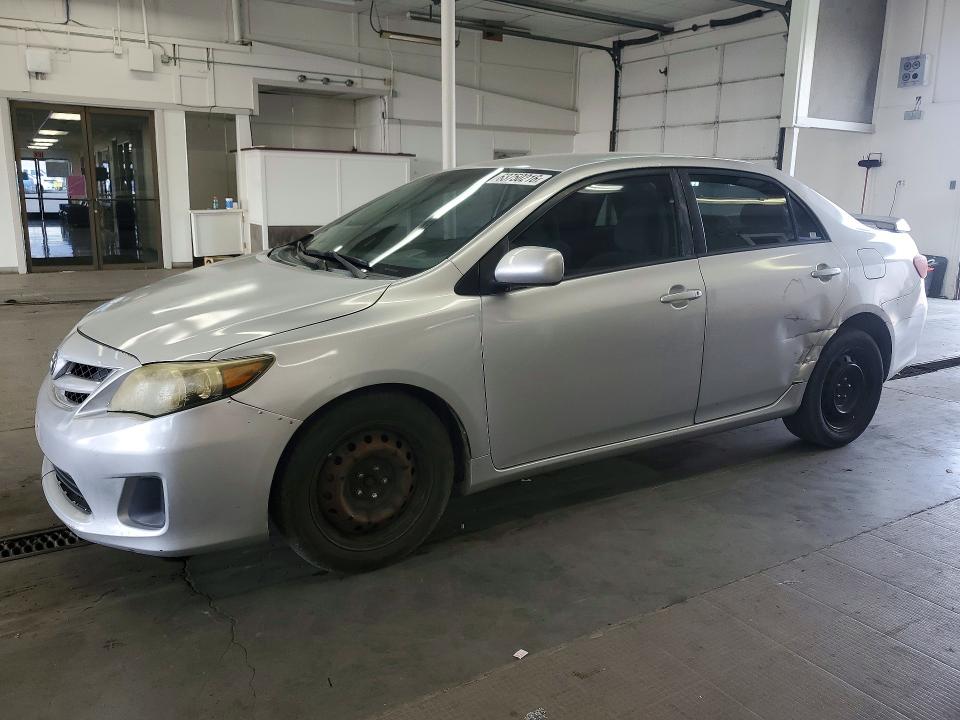 TOYOTA COROLLA 2012 with VIN 2T1BU4EE6CC874999 - Photo from auction