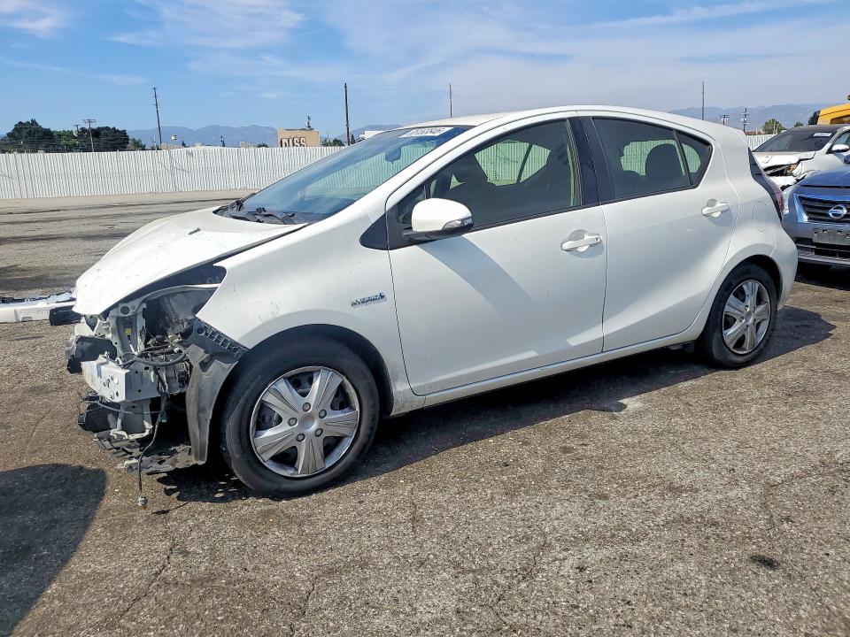 TOYOTA PRIUS C 2015 with VIN JTDKDTB34F1585108 - Photo from auction