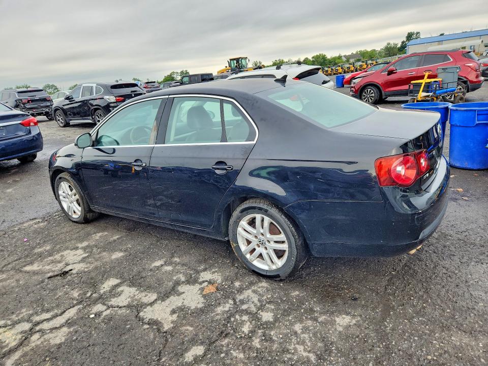 Photo 2 from auction – 2009 VOLKSWAGEN JETTA with VIN 3VWRL71K19M176361