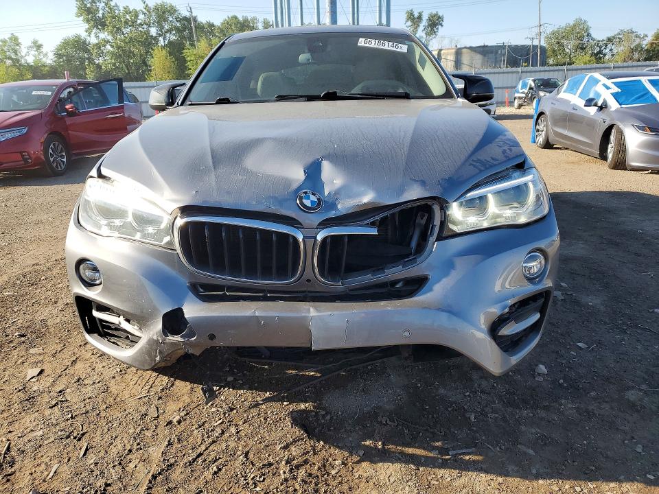 Photo 5 from auction – 2015 BMW X6 with VIN 5UXKU2C55F0F96121