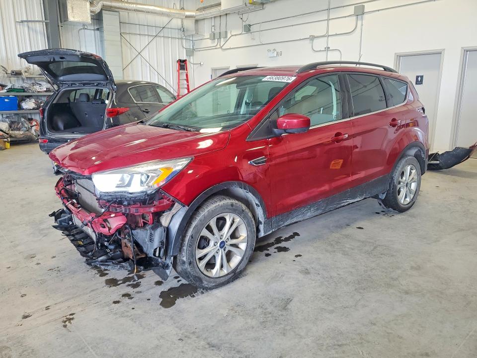 FORD ESCAPE 2017 with VIN 1FMCU9GD0HUB54559 - Photo from auction
