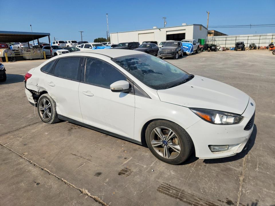 Photo 4 from auction – 2016 FORD FOCUS with VIN 1FADP3FE1GL378943