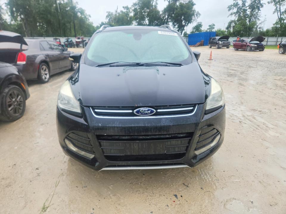Photo 5 from auction – 2016 FORD ESCAPE with VIN 1FMCU0J92GUA91723