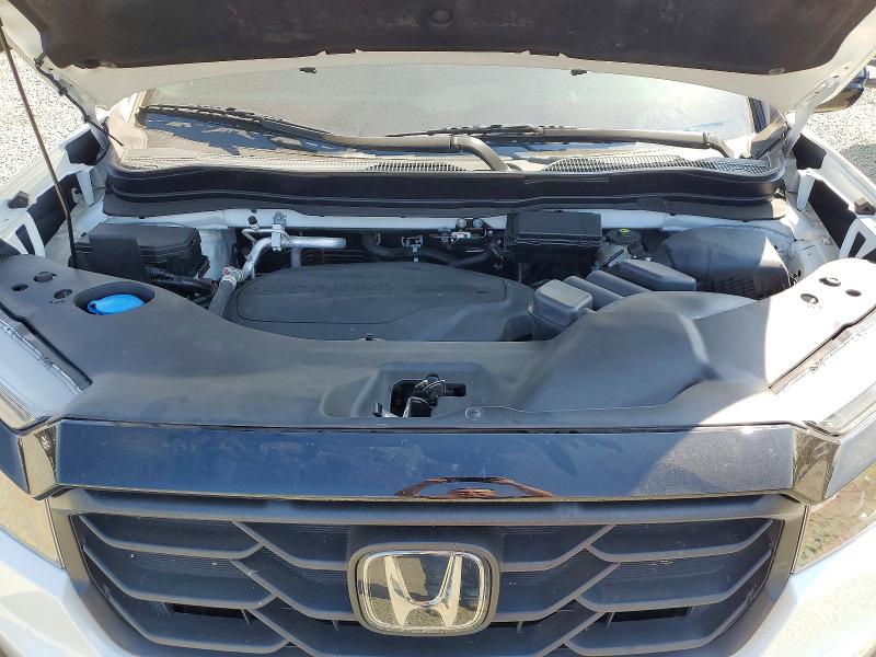 Photo 11 from auction – 2022 HONDA RIDGELINE with VIN 5FPYK3F18NB013352