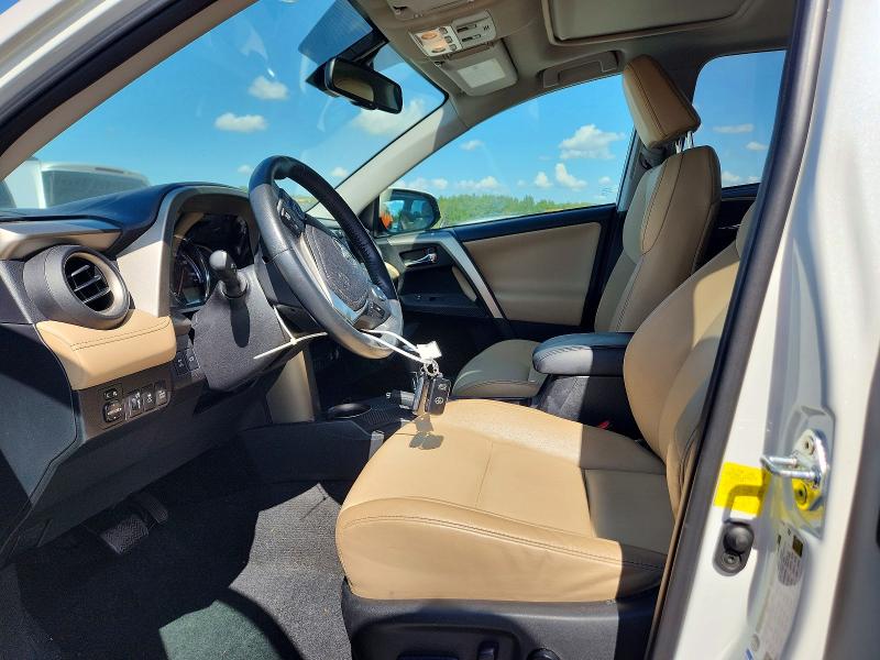 Photo 7 from auction – 2014 TOYOTA RAV4 with VIN 2T3DFREV3EW207140