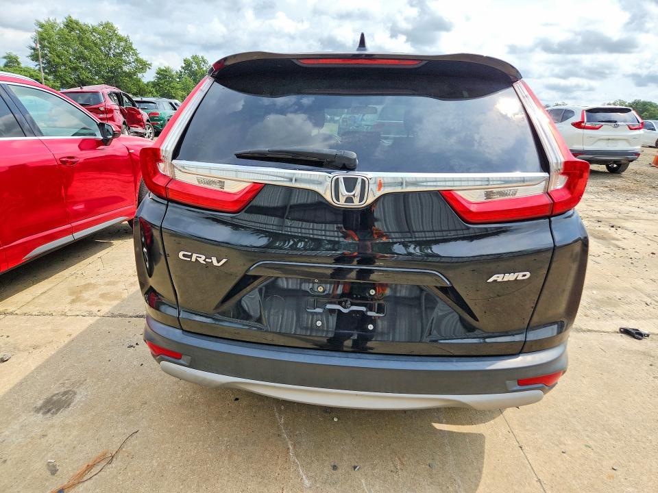 Photo 6 from auction – 2018 HONDA CR-V with VIN 7FARW2H56JE079327