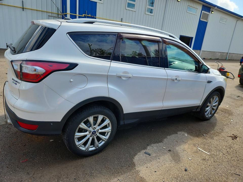 Photo 3 from auction – 2017 FORD ESCAPE with VIN 1FMCU9J98HUC39959
