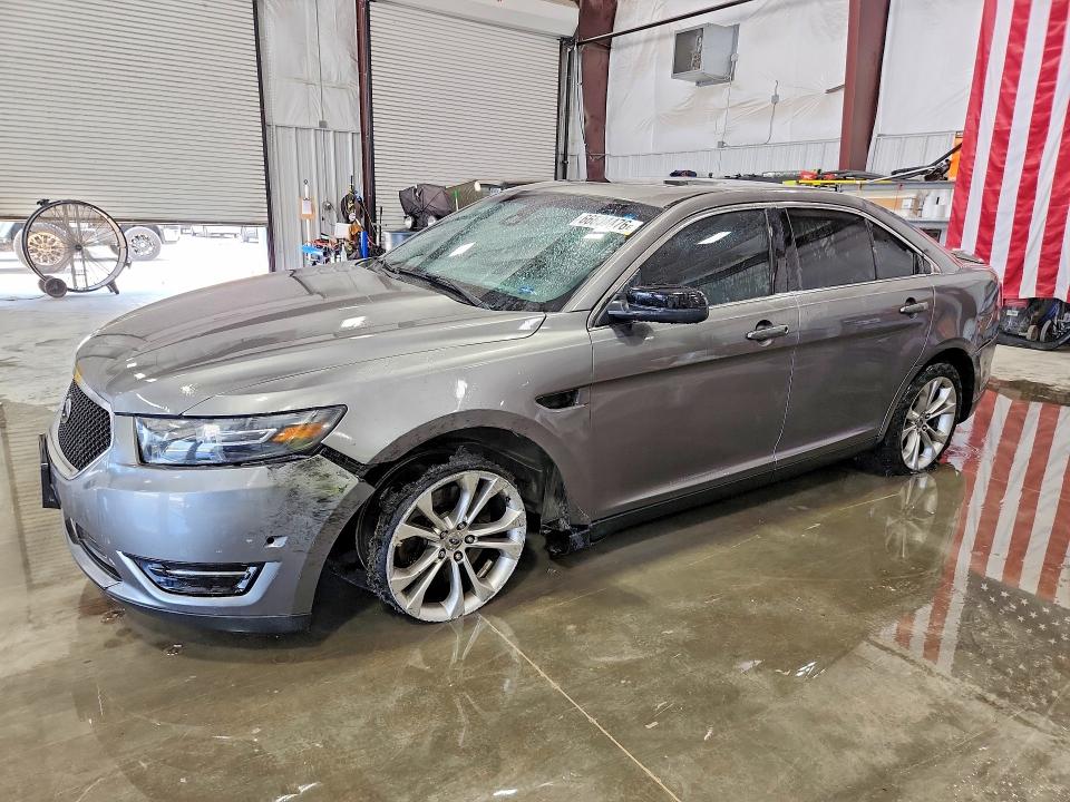 FORD TAURUS 2013 with VIN 1FAHP2KT7DG183210 - Photo from auction