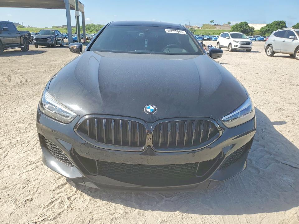 Photo 5 from auction – 2021 BMW M850XI with VIN WBAGV8C08MCF68611
