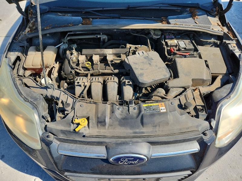 Photo 11 from auction – 2014 FORD FOCUS with VIN 1FADP3F29EL249044