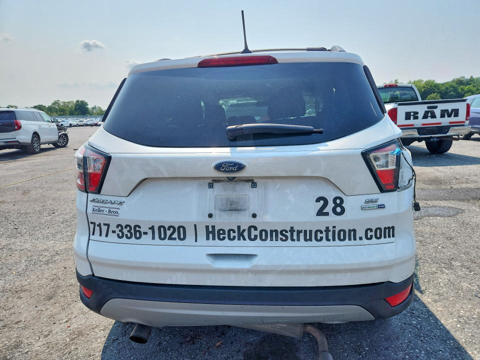 Photo 6 from auction – 2018 FORD ESCAPE with VIN 1FMCU9GD1JUA15742