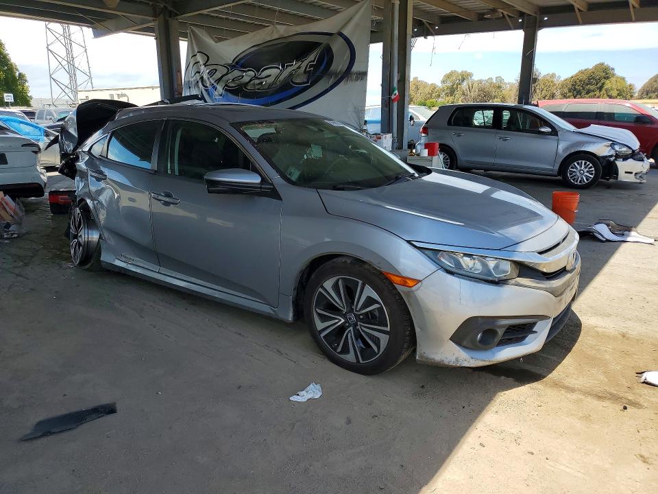 Photo 4 from auction – 2016 HONDA CIVIC with VIN 19XFC1F3XGE202693