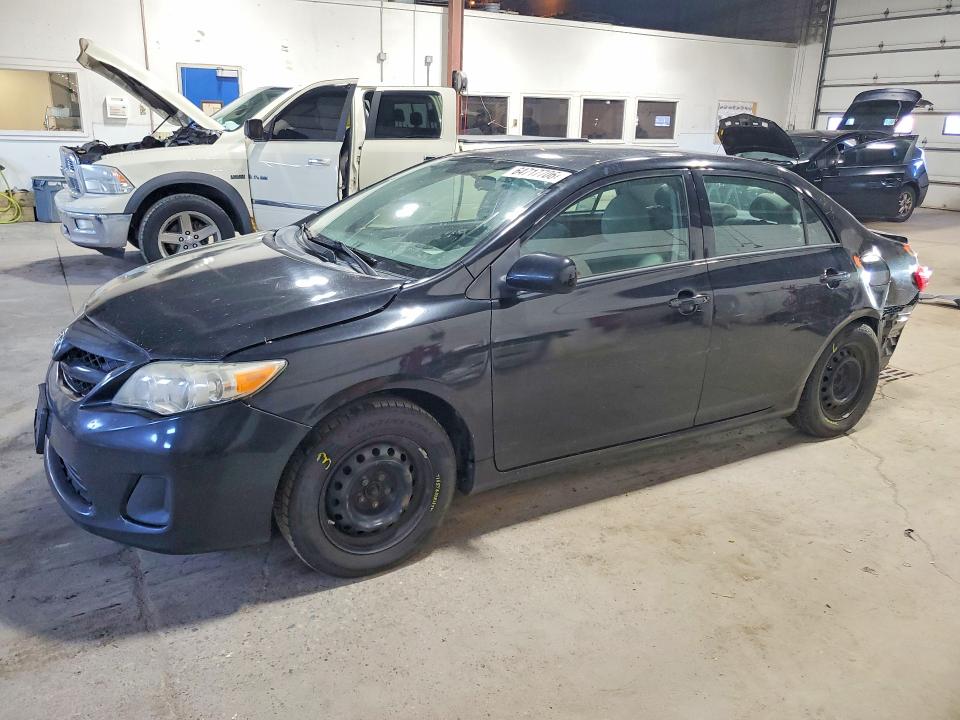 TOYOTA COROLLA 2011 with VIN 2T1BU4EE9BC722892 - Photo from auction