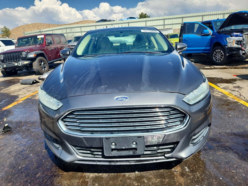 Photo 5 from auction – 2016 FORD FUSION with VIN 3FA6P0H73GR355638