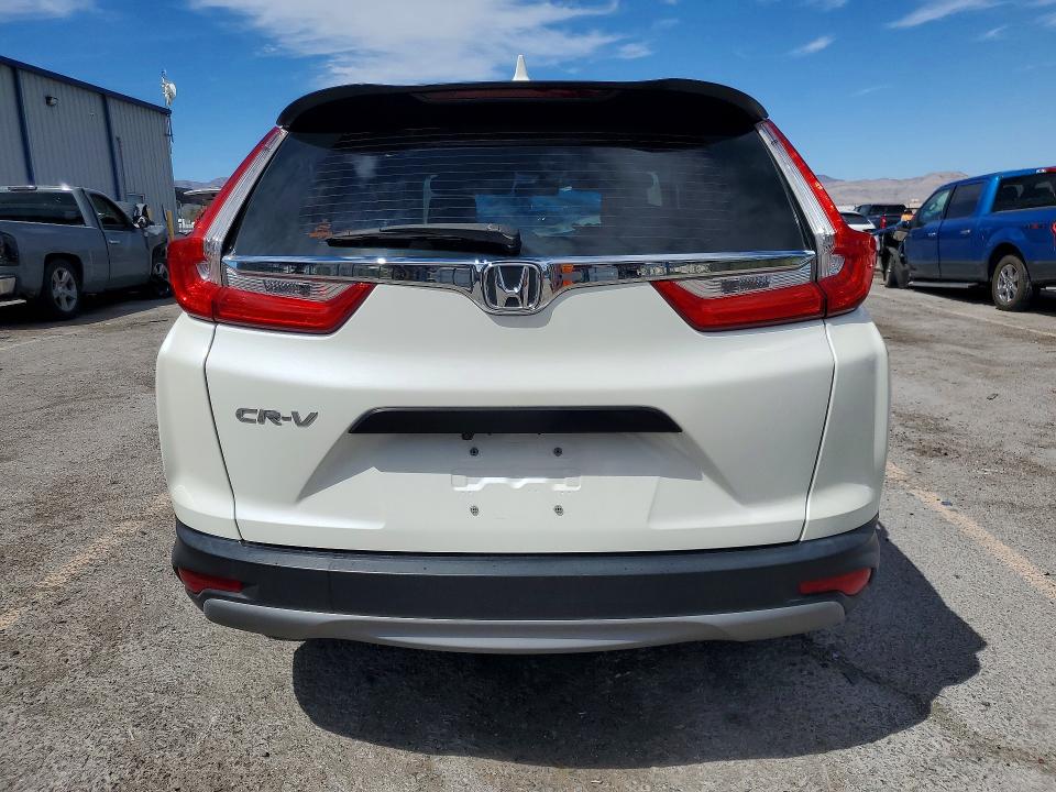 Photo 6 from auction – 2018 HONDA CR-V with VIN 2HKRW5H34JH401296