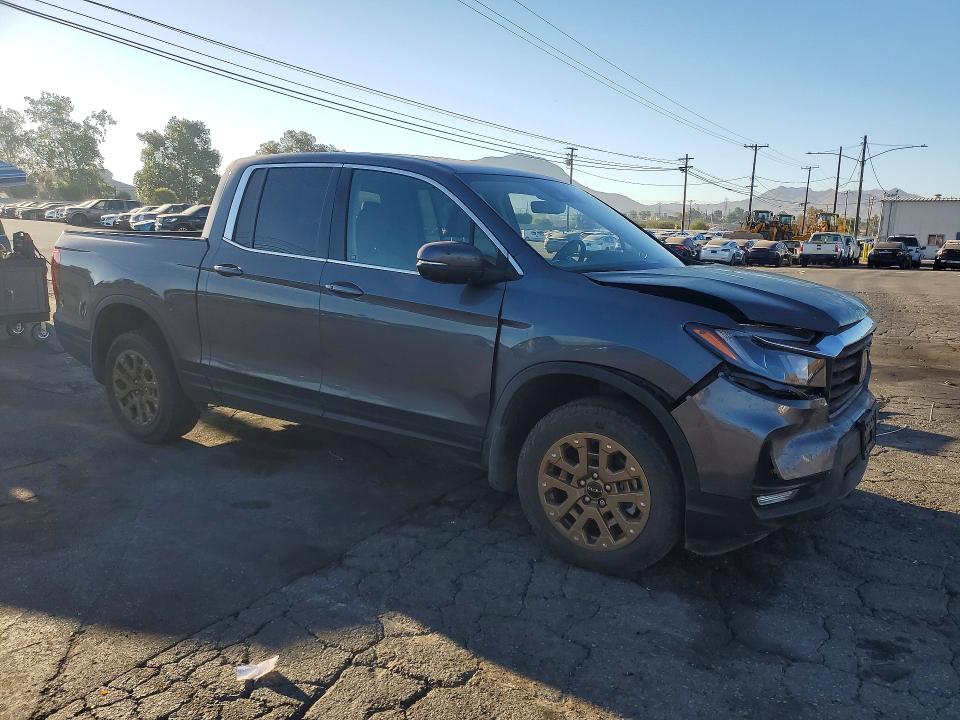 Photo 4 from auction – 2023 HONDA RIDGELINE with VIN 5FPYK3F56PB058246