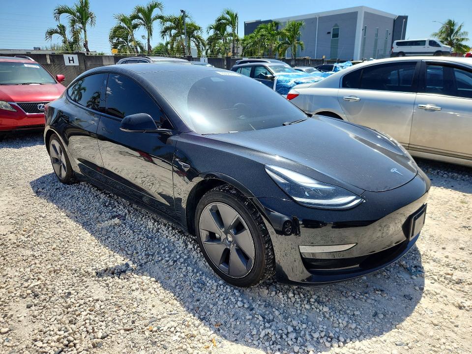 Photo 4 from auction – 2021 TESLA MODEL 3 with VIN 5YJ3E1EA4MF058450