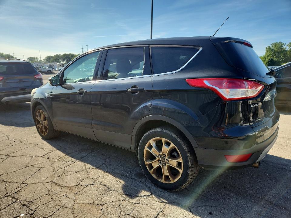 Photo 2 from auction – 2013 FORD ESCAPE with VIN 1FMCU0HX0DUB57220