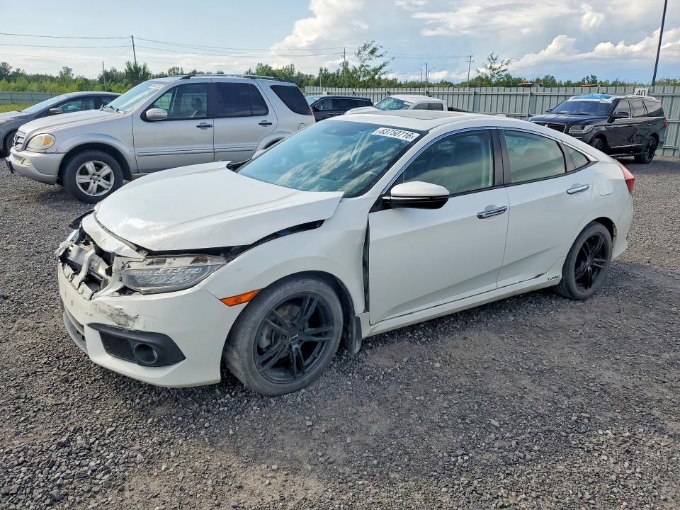 HONDA CIVIC 2018 with VIN 2HGFC1F97JH105498 - Photo from auction
