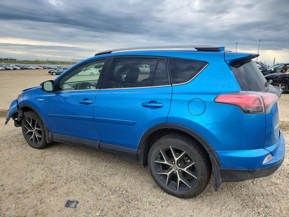 Photo 2 from auction – 2018 TOYOTA RAV4 HV with VIN JTMJJREV7JD219994