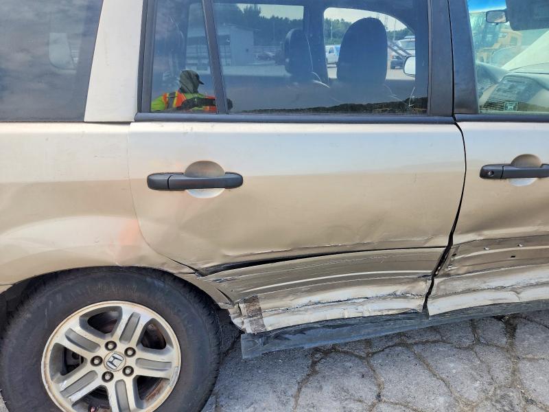 Photo 10 from auction – 2005 HONDA PILOT with VIN 5FNYF18595B017248