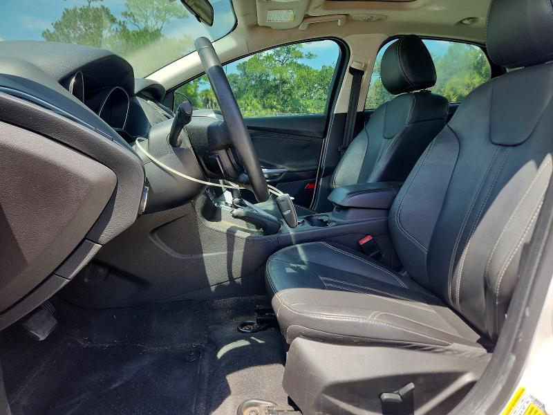 Photo 7 from auction – 2014 FORD FOCUS with VIN 1FADP3J21EL240653