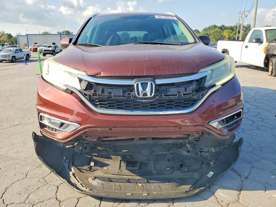Photo 5 from auction – 2016 HONDA CR-V with VIN 2HKRM3H71GH528626