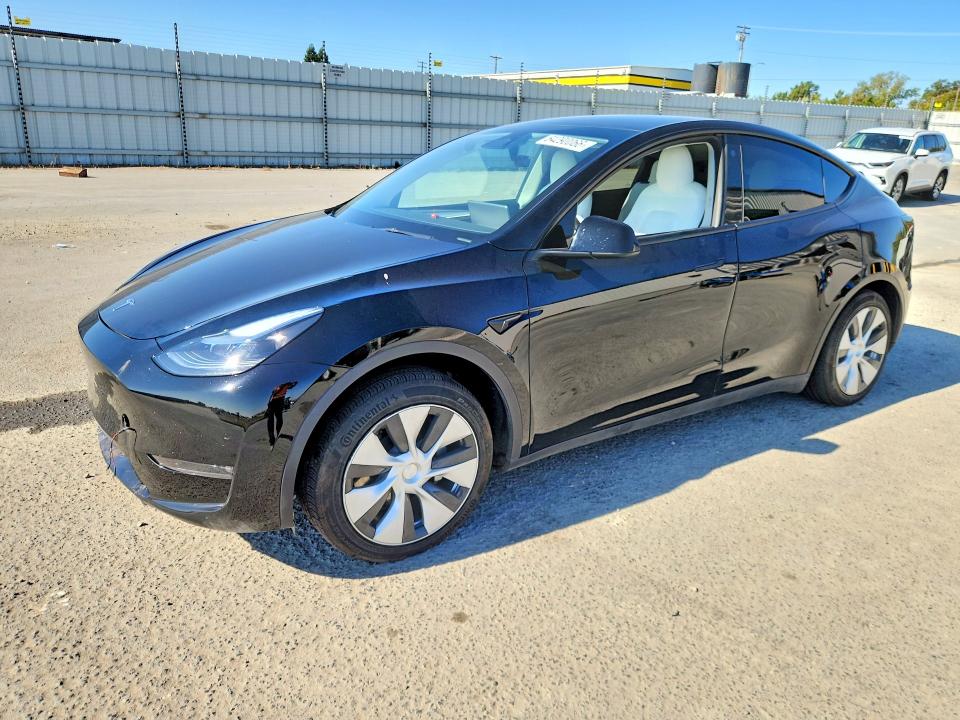 TESLA MODEL Y 2023 with VIN 7SAYGAEE4PF640560 - Photo from auction