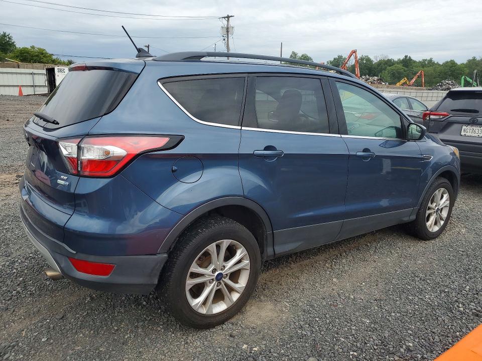 Photo 3 from auction – 2018 FORD ESCAPE with VIN 1FMCU9GD9JUB33232