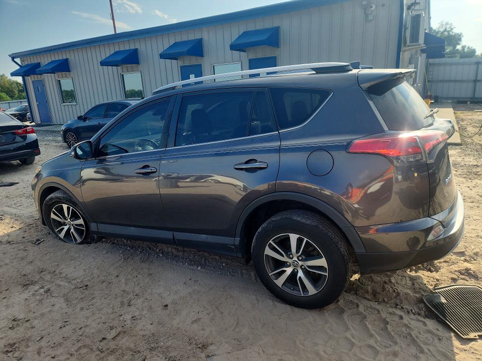 Photo 2 from auction – 2018 TOYOTA RAV4 with VIN 2T3WFREV9JW516047
