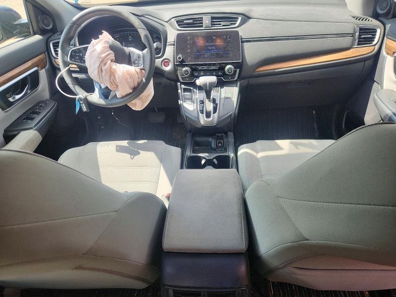Photo 8 from auction – 2018 HONDA CR-V with VIN 7FARW2H55JE082350