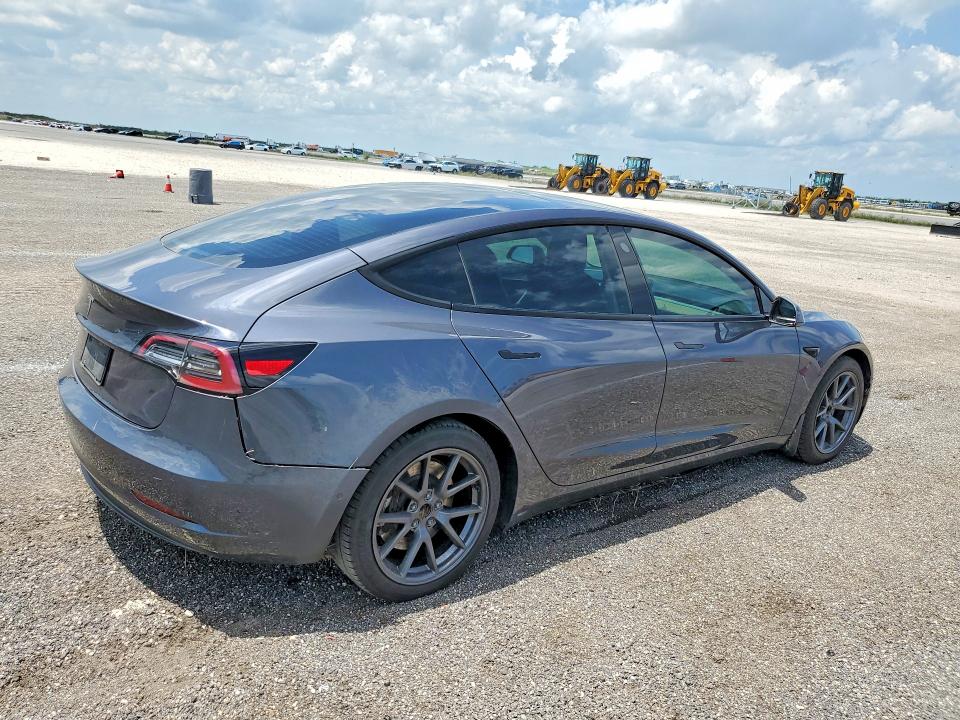Photo 3 from auction – 2021 TESLA MODEL 3 with VIN 5YJ3E1EAXMF083076