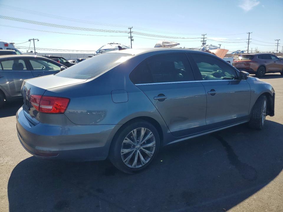Photo 3 from auction – 2015 VOLKSWAGEN JETTA with VIN 3VWD17AJ2FM323077