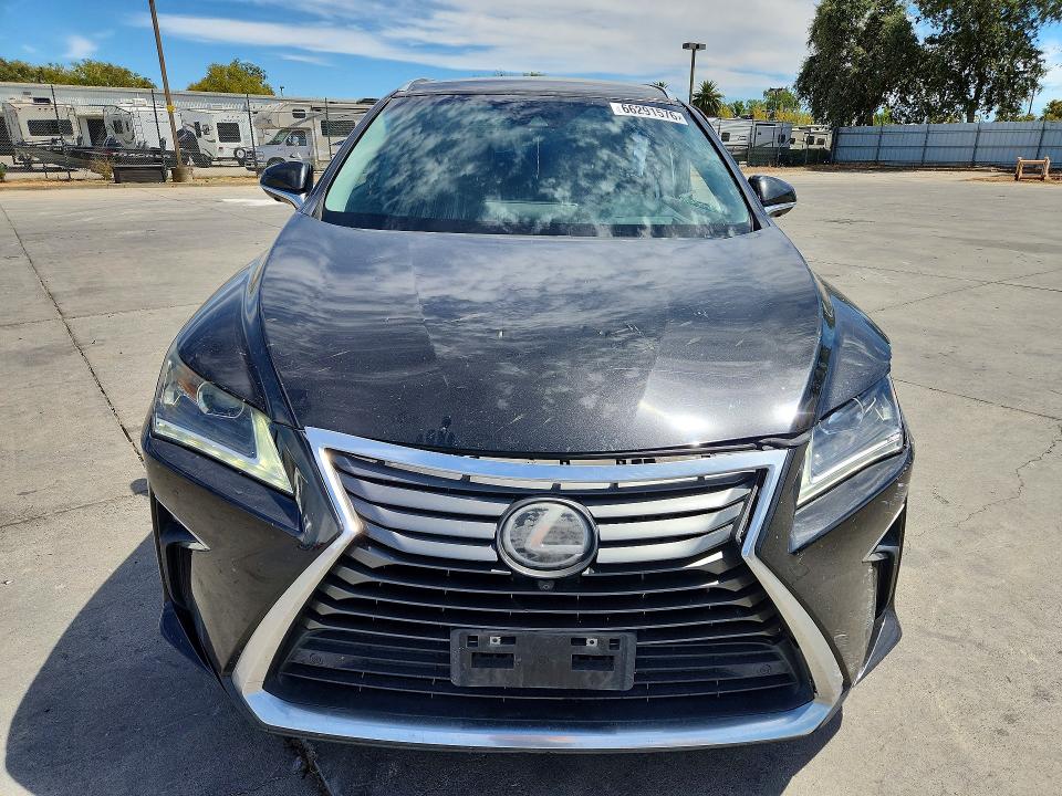 Photo 5 from auction – 2016 LEXUS RX with VIN 2T2ZZMCA0GC022391