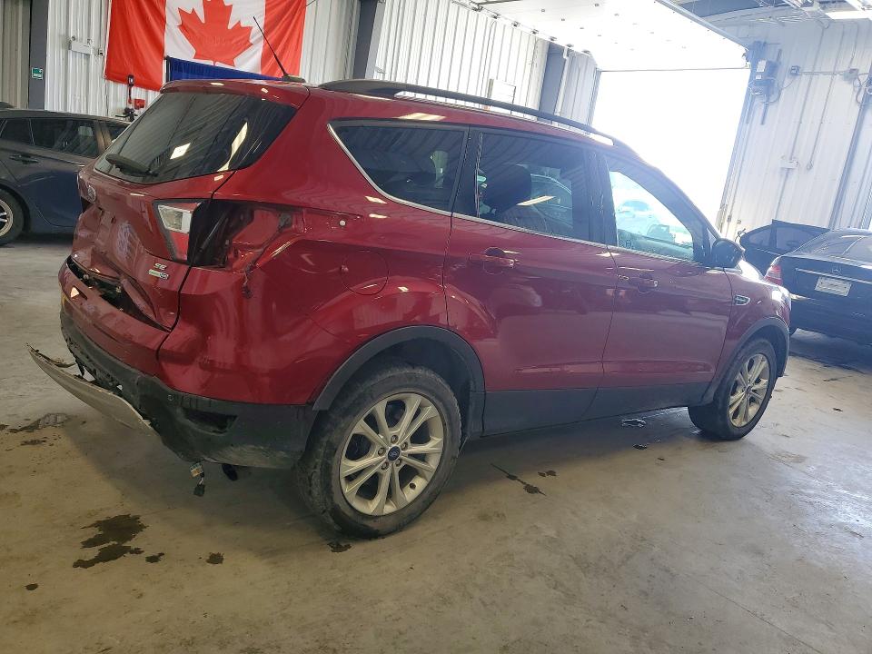 Photo 3 from auction – 2017 FORD ESCAPE with VIN 1FMCU9GD0HUB54559