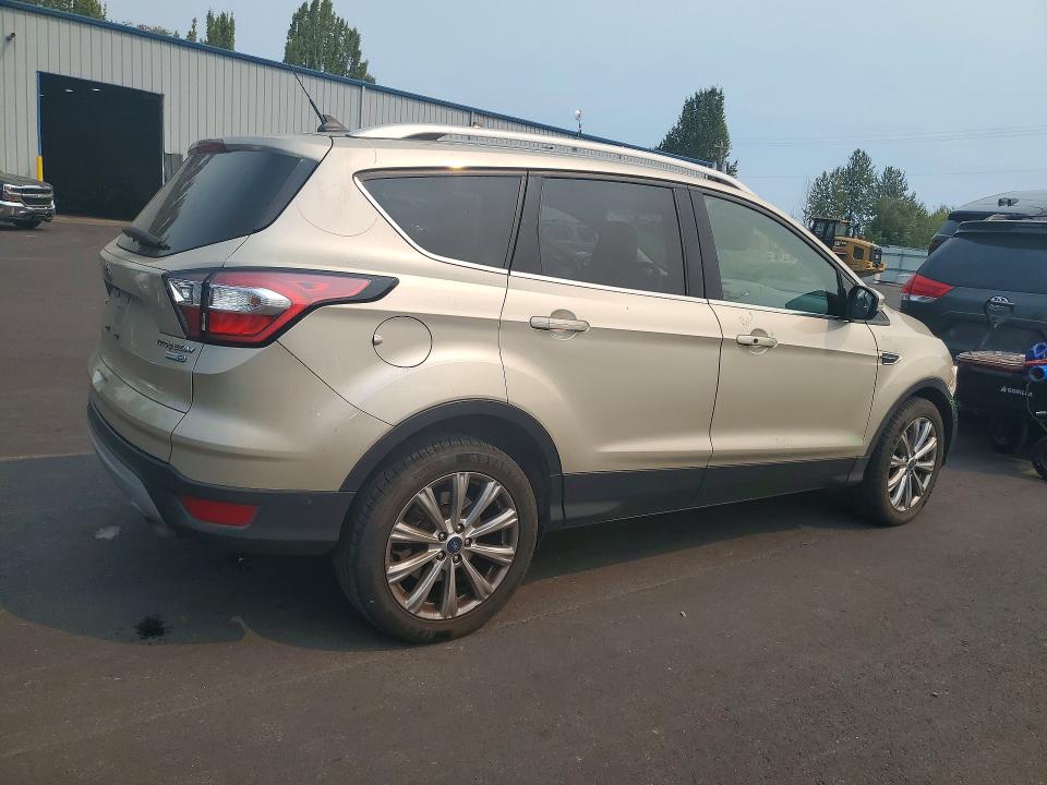 Photo 3 from auction – 2018 FORD ESCAPE with VIN 1FMCU9J90JUC89406