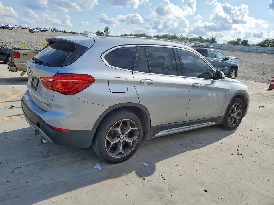 Photo 3 from auction – 2018 BMW X1 with VIN WBXHU7C38J3H43856