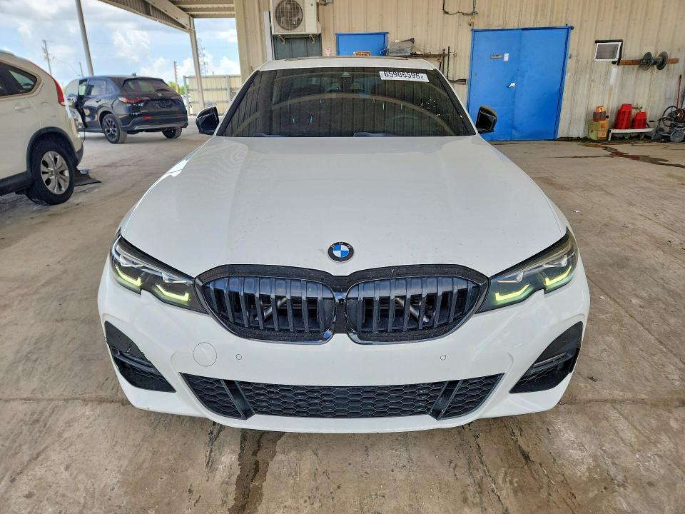 Photo 5 from auction – 2022 BMW 330I with VIN 3MW5R1J09N8C51707