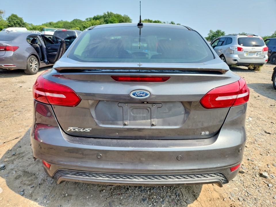 Photo 6 from auction – 2015 FORD FOCUS with VIN 1FADP3F24FL237885