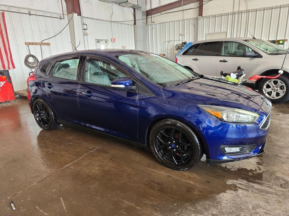 Photo 4 from auction – 2016 FORD FOCUS with VIN 1FADP3K22GL386237