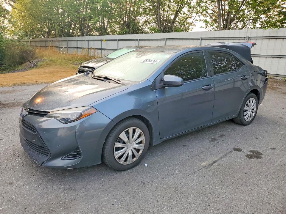 TOYOTA COROLLA 2018 with VIN 2T1BURHE1JC073287 - Photo from auction